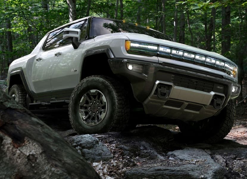 2022 GMC Hummer EV Pickup Truck side front view off road