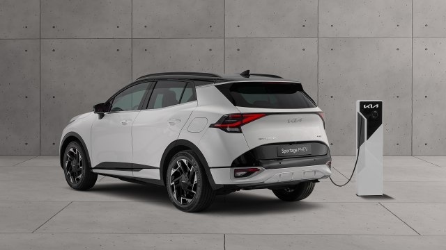 2022 Kia Sportage Hybrid SUV side rear view charging station