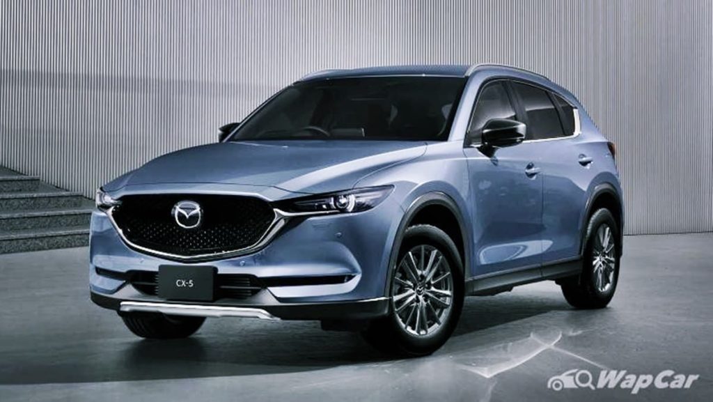 New 2023 Mazda CX-5 side front view