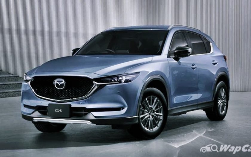 New 2023 Mazda CX-5 side front view