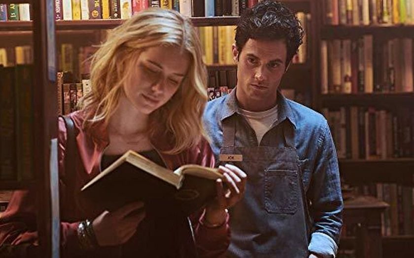 You Season 3 cast Joe Goldberg and Elizabeth Lail in library