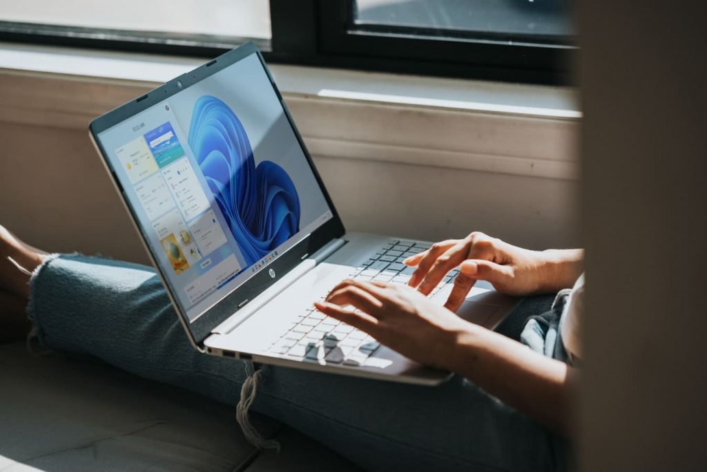 person working on Windows 11 computer PC